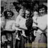 Norma Strachan is the one on the right ,  -  Patricia Ogston is the baby being held by the girl in the middle.