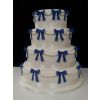 Royal blue bows on wedding cake