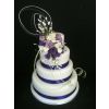 large spray flowers three tier wedding cake