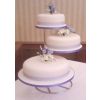 three tier wedding cake on stand