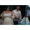 Robert and Sarah's wedding day and the cutting of the cake