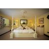Four poster bed.