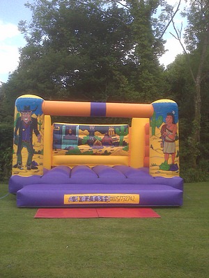 20ft x 20ft western adult bouncy castle.