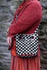 eyelet shoulder bag