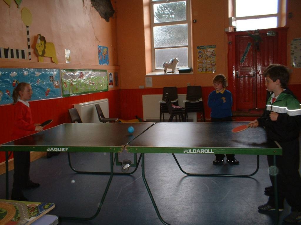 children playing table tennis