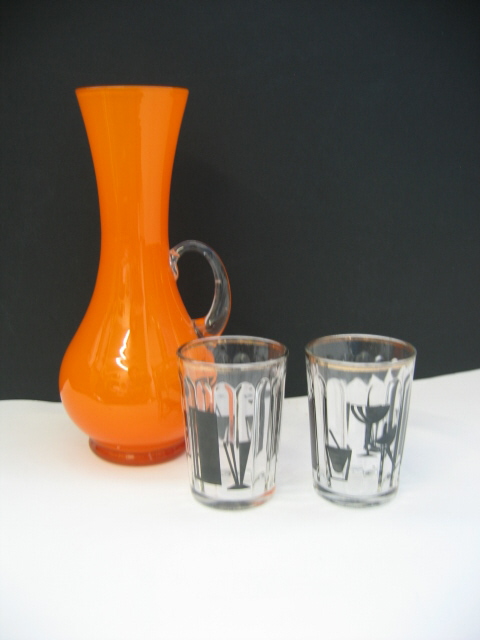 vintage orange glass caraffe and shot glasses